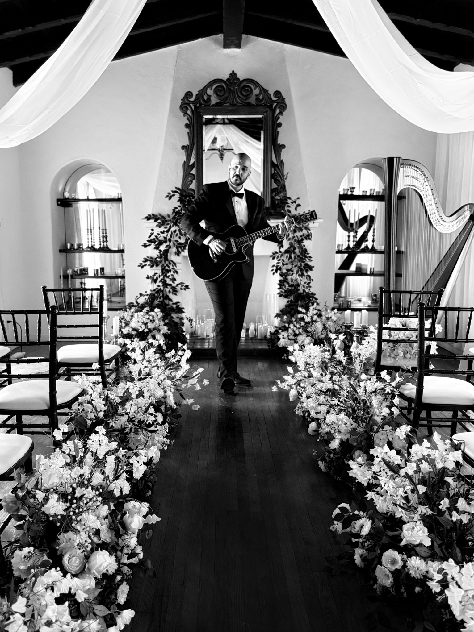 J. Daniel performing fingerstyle guitar at a Southern California wedding